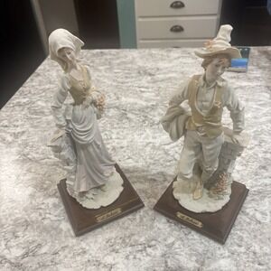A Belcari Lady And Man  11" Tall Figurine With Wood Base 1984